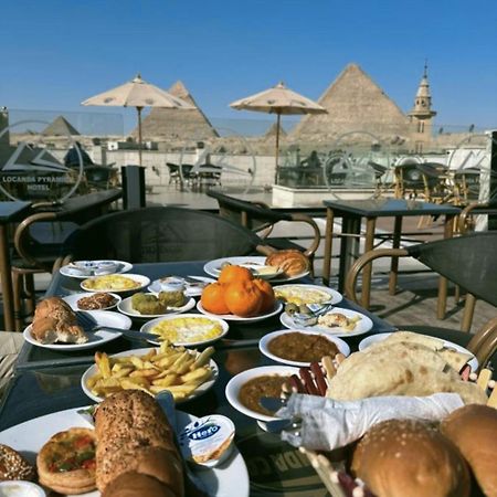 Locanda Pyramids Hotel Kafret el-Gabal Esterno foto