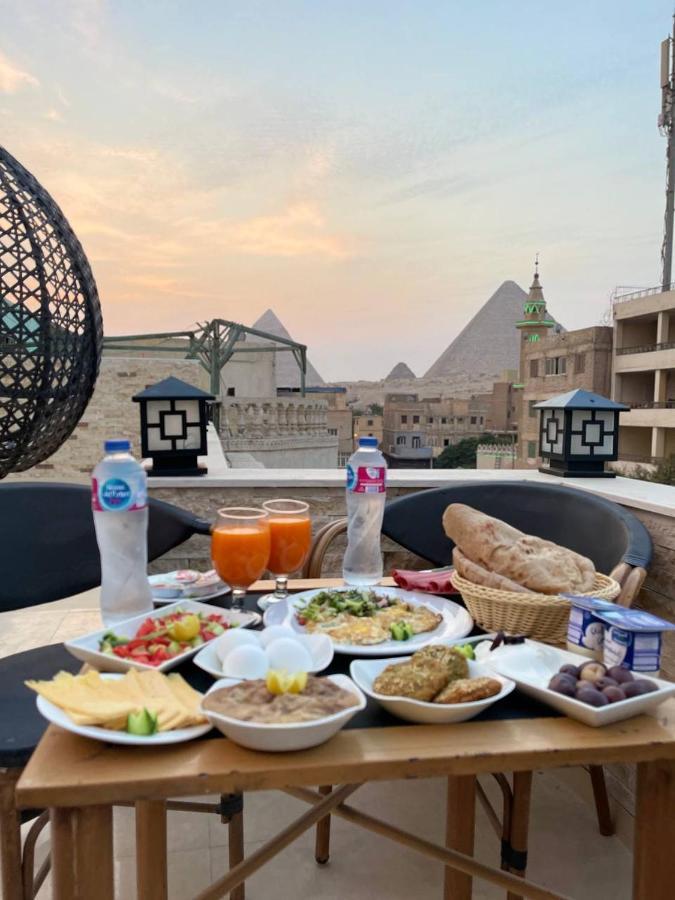Locanda Pyramids Hotel Kafret el-Gabal Esterno foto